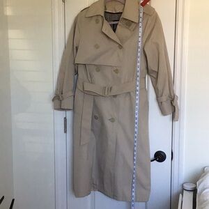 Vintage London Fog women's double-breasted trench coat with removable lining.